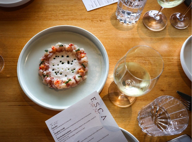 Chef’s Table dish with paired white wine at Esca Bimbadgen as part of Vineyard to Table experience